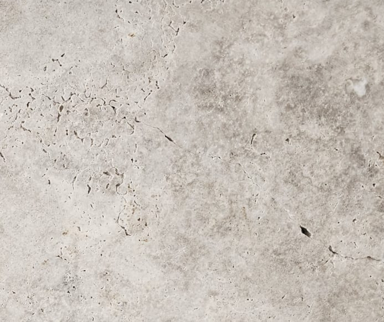 Oyster Grey Silver Travertine Pavers displayed as an outdoor paving option — Natural Stone Paving