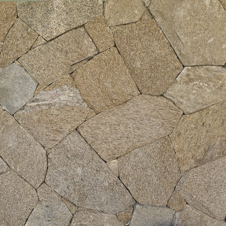 Close-up of an irregular stone wall, showcasing Stormwood Stone Cladding in tan and gray hues—ideal for feature walls or fireplaces, with visible seams and natural split textures adding distinctive character. — Stone Cladding