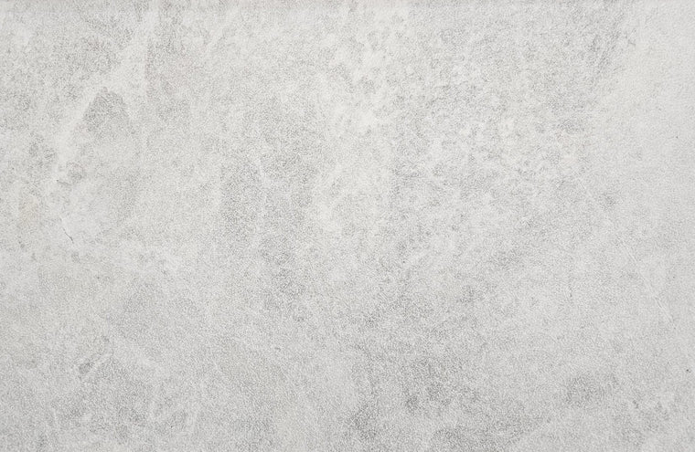 Vela White Sandblasted Marble Pavers showing its natural colour, finish and stone variation — Natural Stone Paving