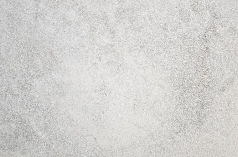 Close-up of Vela White Sandblasted Marble Pavers surface colour and texture — Natural Stone Paving