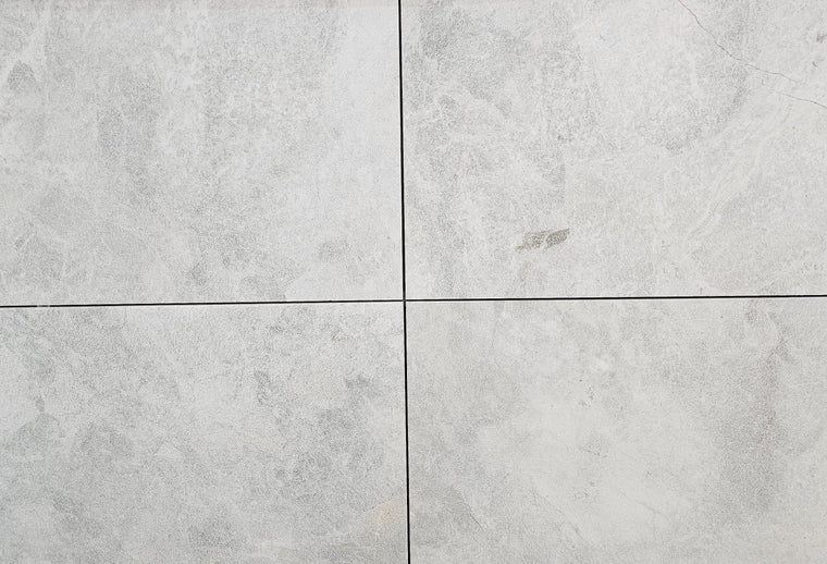 Vela White Sandblasted Marble Pavers displayed as an outdoor paving option — Natural Stone Paving