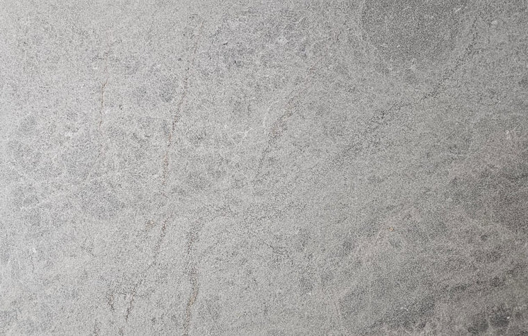 Natural tonal variation across Ashmere Grey Marble Sandblasted Pavers pieces — Natural Stone Paving