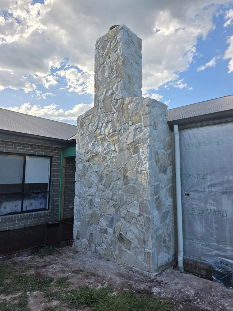 Joint detail and stone variation in Cresta Beige Stone Cladding — Stone Cladding